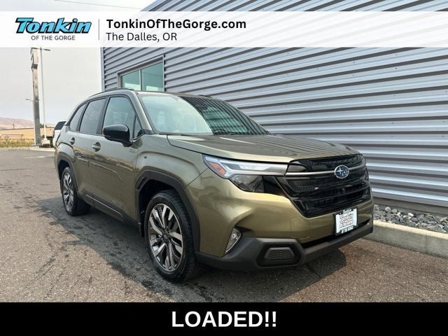 2026 Subaru FORESTER Touring Hybrid in Autumn Green Metallic — front three-quarter view