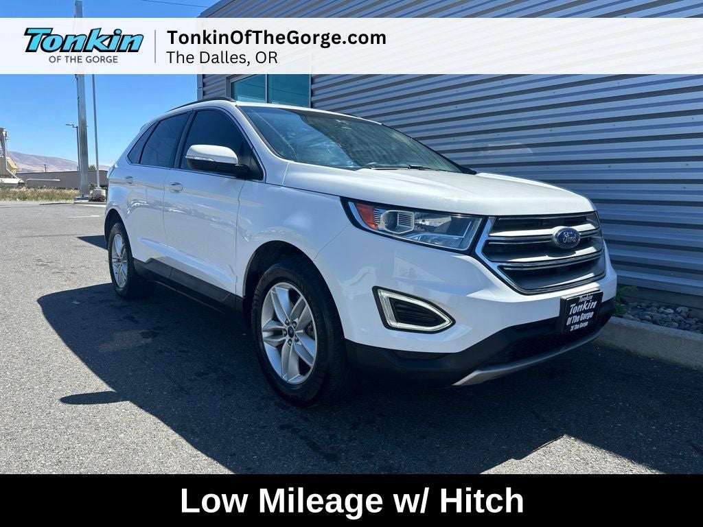 2018 Ford Edge SEL in Oxford White — front three-quarter view