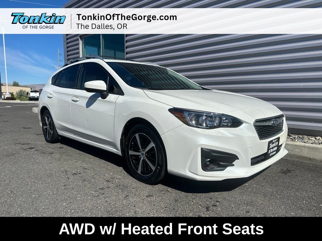 2019 Subaru Impreza 2.0i Premium in Crystal White Pearl — front three-quarter view