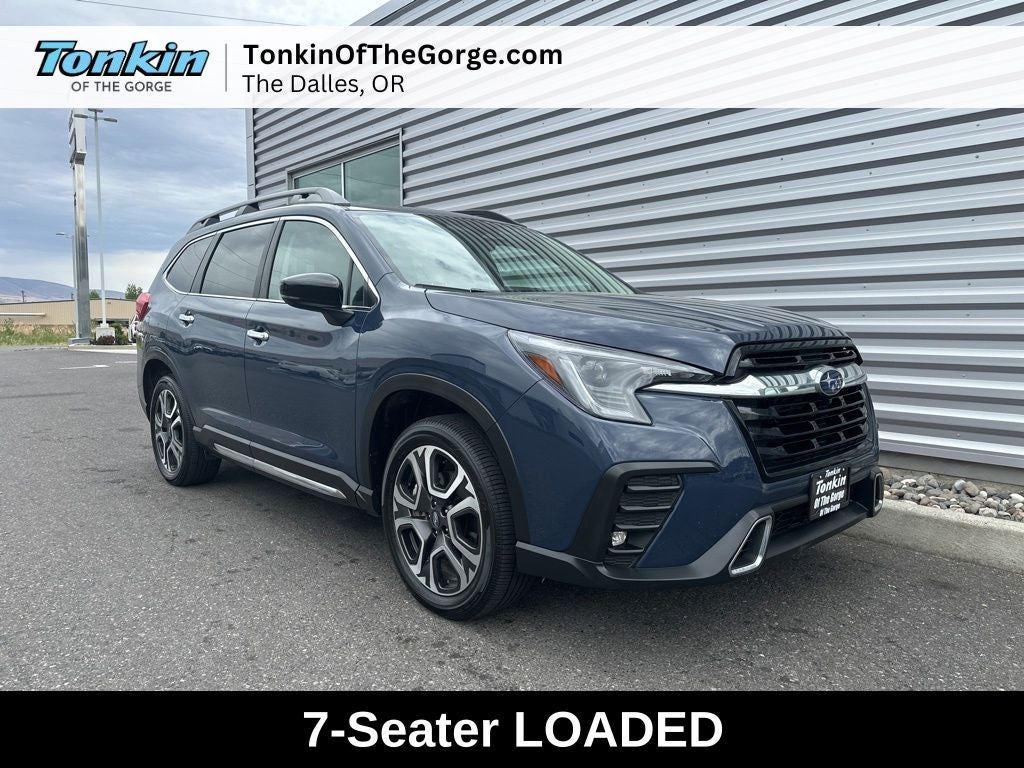 2025 Subaru Ascent Touring in Cosmic Blue Pearl — front three-quarter view