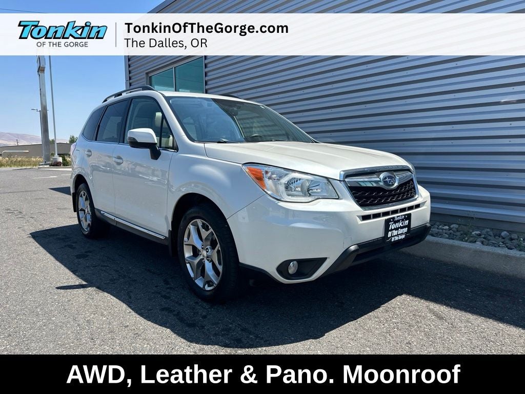 2015 Subaru Forester 2.5i Touring in Satin White Pearl — front three-quarter view